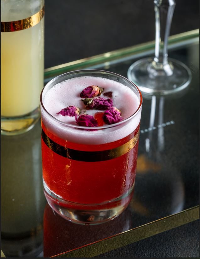 A Pair Of Lowball Glasses With A Gold Band